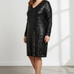 Robe noire scintillante – Coupe fluide & décolleté féminin pour soirées élégantes