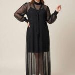 Robe longue plumetis noire – Élégance transparente & allure moderne