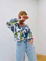 Pull Maille Fluide À Col V Imprimé Visage Artistique Moderne