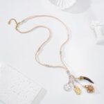 Collier Sautoir Bohème Chic À Pampilles Dorées Et Cordon Nude