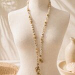 Sautoir perles et pendentifs - Marque INCONNUE