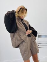 Veste sans manches à carreaux