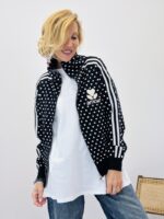 Veste col montant en maille motif pois