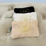 Mini Pochette œil doré – Touche bohème et détail précieux