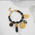 Bracelet noir et or – Charme mystique en acier inoxydable